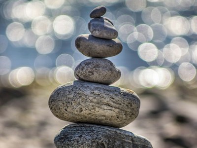 Small stones balanced on top of each other.